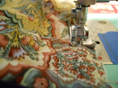 Sewing front and back to crossover strip.