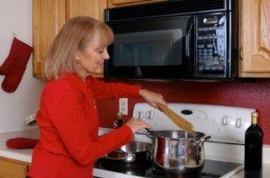 a woman cooking with sherry