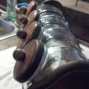 Glass canisters in rack.