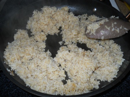 Frying rice.