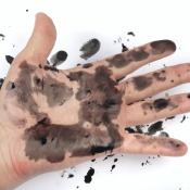 Printer ink on a hand.