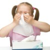 Little Girl using Kleenex Facial Tissues