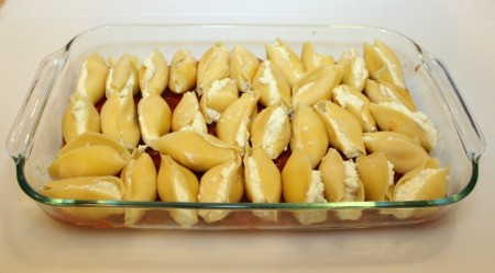 filled shells in pan