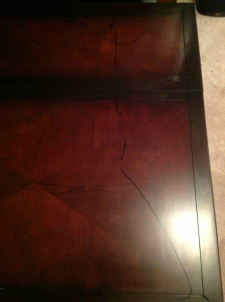 Marker lines on coffee table.