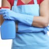 A woman wearing cleaning gloves.