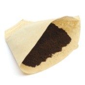 Coffee filter with coffee in it.