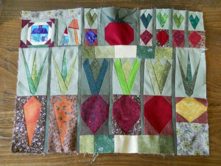 Pieces sewn together, but border not added yet.