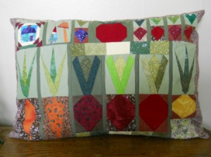 Vegetable garden motif pillow cover.