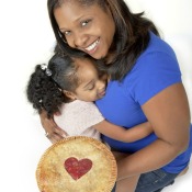 Woman and Daughter and Pie Cooked with Love