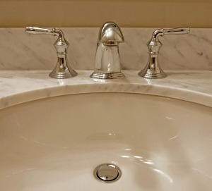 A porcelain sink in a bathroom.