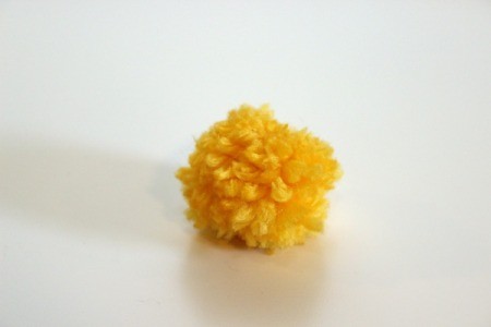 yellow pom pom