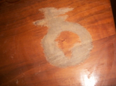 White cloudy mark on dining table.