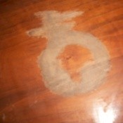 White cloudy mark on dining table.