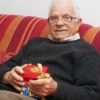 elderly man with a gift