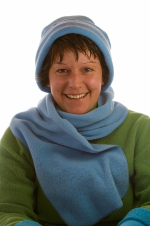 Woman wearing a fleece scarf.
