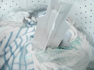 Washing light colored laundry without chlorine bleach.