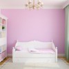 Nursery with pink walls.