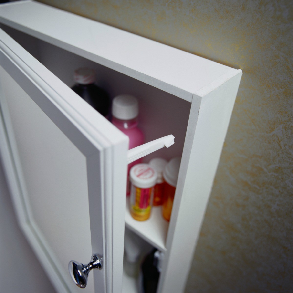 bathroom cabinet door won't stay closed? | thriftyfun