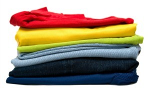 A colorful stack of new clothing.
