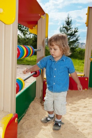 Child Playing at Summer Childcare Center