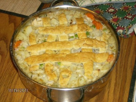 A homemade pot pie on a table.
