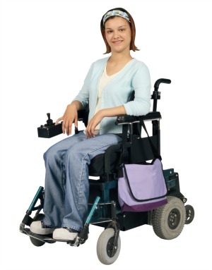 A young woman in an electric wheelchair.