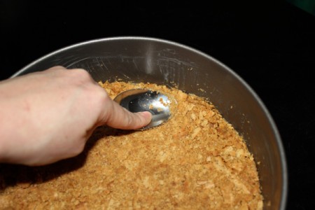 Do final press around edges with a spoon.