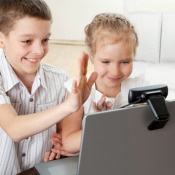 Two kids using video Skype.