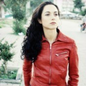 Girl wearing a leather jacket.
