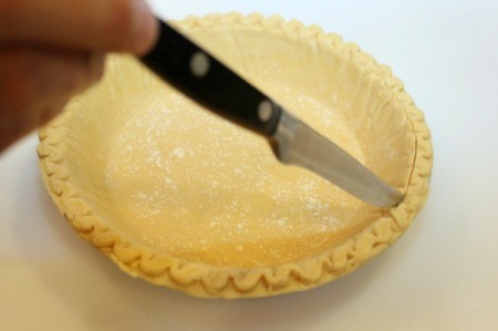 trim off edge of crust