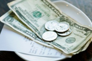 A tip on a table in a restaurant.