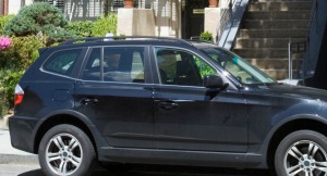 A car parked on a sunny day.