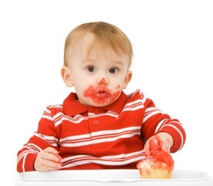 A child eating and making a mess.