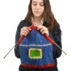 A teen knitting a house.