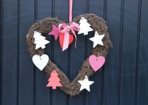 Heart shaped wreath on a door.