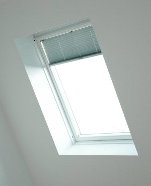 Skylight light with mini blinds.