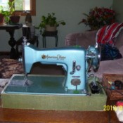 Machine in portable case base.