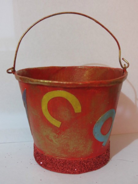 After adding glitter give it a wash of gold.