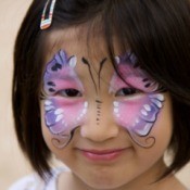 Young girl with face paint on.