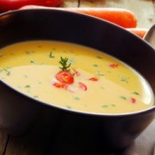 A bowl of carrot soup.