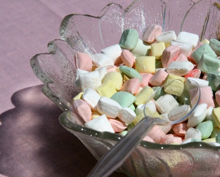 Wedding mints in a serving dish at a wedding reception.