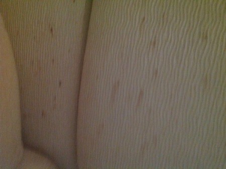 Brownish spots on upholstery.