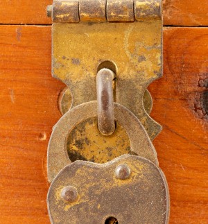 Close up of a lock on a cedar chest.