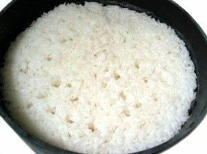 Rice in a cast iron pan.