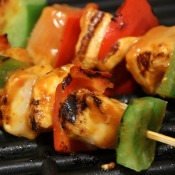 Grilling kabobs for a summer party.