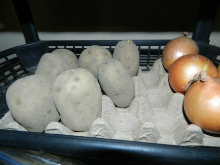 Egg Crates for Veggie Storage - Potatoes and onions in egg crates.