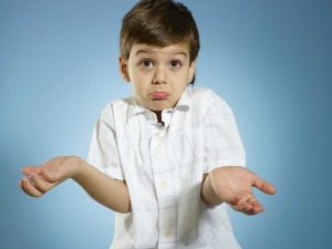 5 year old boy with his hands in the air.