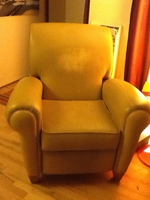 Yellow vinyl recliner.