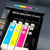 Ink cartridges inside of a printer.