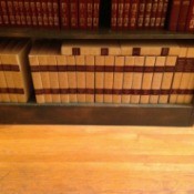Volumes on shelf.